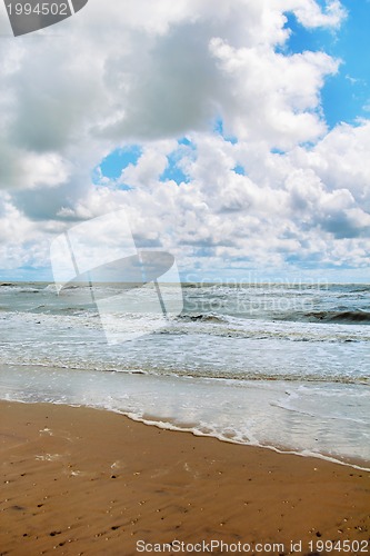 Image of Cloudy sky over the stormy sea