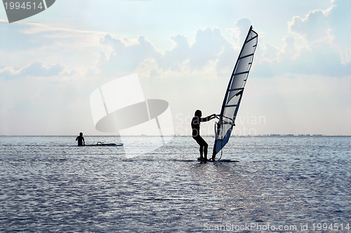 Image of Silhouette of a windsurfer