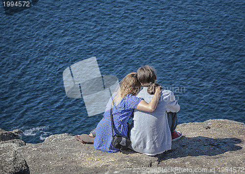 Image of Young couple by the sea