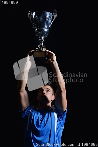 Image of soccer players celebrating victory