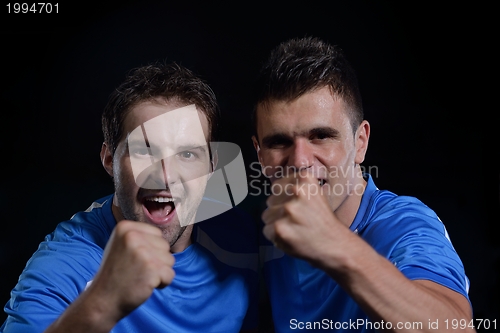 Image of soccer players celebrating victory