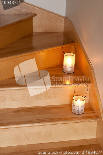 Image of Lanterns decorating wooden staircase