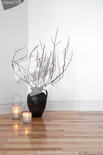 Image of Lanterns and tree branches decorating a room