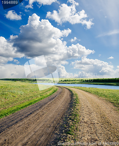 Image of rural road to cloudy horizon