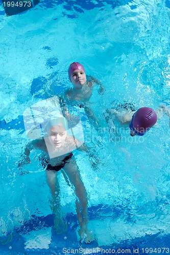 Image of happy child on swimming pool