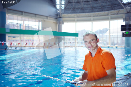 Image of happy child on swimming pool