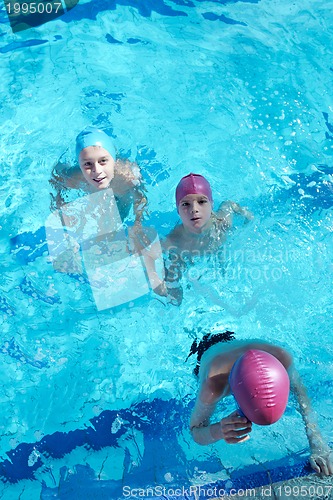 Image of happy child on swimming pool