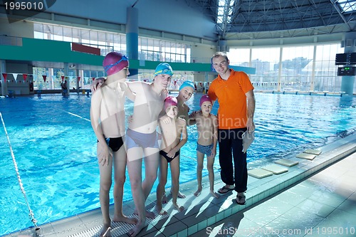 Image of happy child on swimming pool