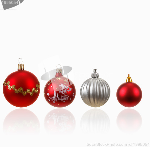 Image of Collection of four Christmas balls on white