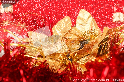 Image of Red christmas balls and decorations on red