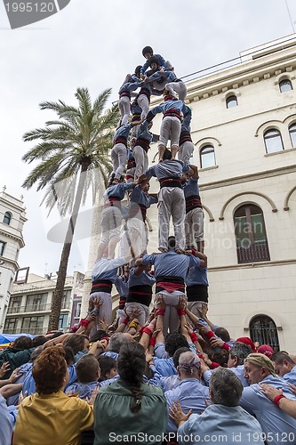 Image of Castellers, girls and drop-tower