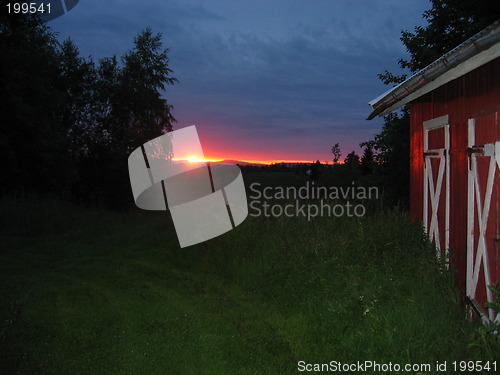 Image of sunset by barn