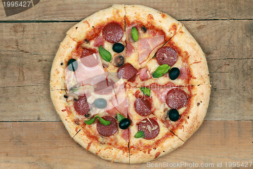 Image of Pizza with ham and pepperoni