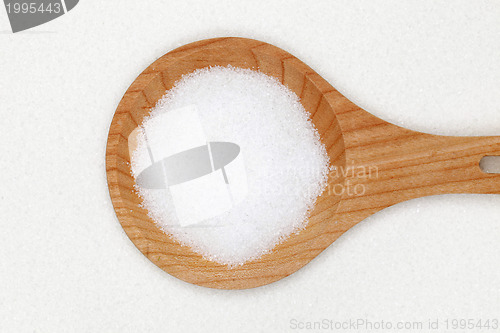 Image of Sugar on a wooden spoon