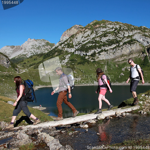 Image of Young people hiking in the mountains