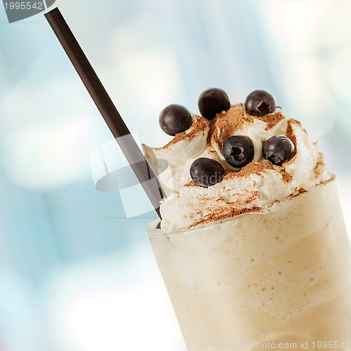 Image of smoothie with cream and berries