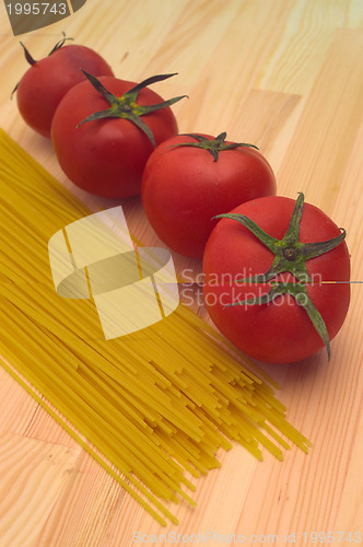 Image of fresh tomato and spaghetti pasta