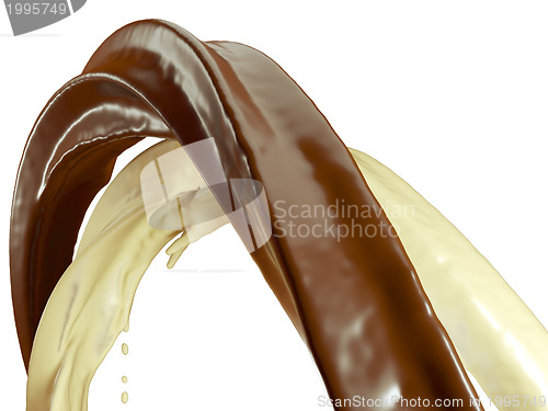 Image of Drinks: Hot dark and milk chocolate flow isolated on white
