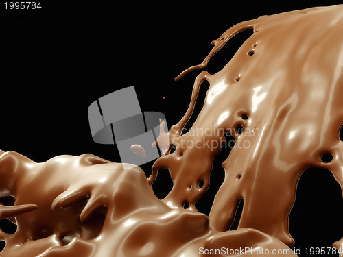 Image of Hot chocolate or cocoa flow isolated over black 