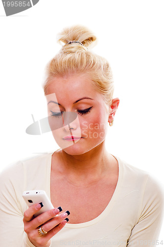 Image of The young woman talks by a mobile phone