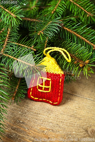 Image of christmas fir tree with handmade decoration 