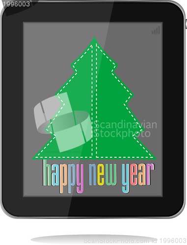 Image of christmas and new year tree on tablet pc