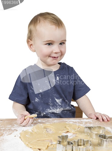 Image of child making cookies