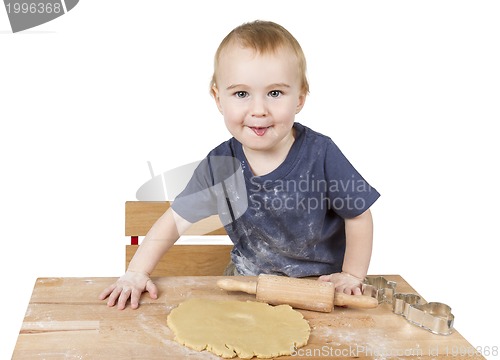 Image of child making cookies