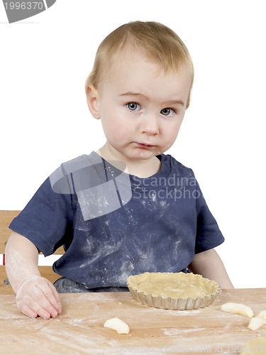 Image of child making cookies