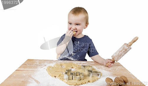 Image of child making cookies