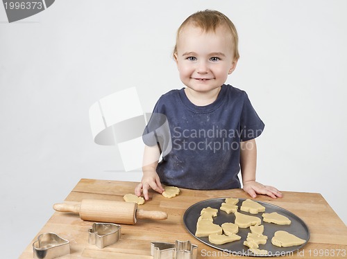 Image of child making cookies