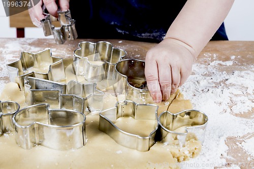 Image of making cookies on wooden desk