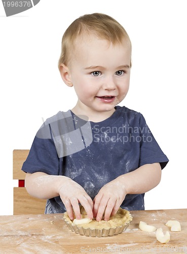 Image of child making cookies