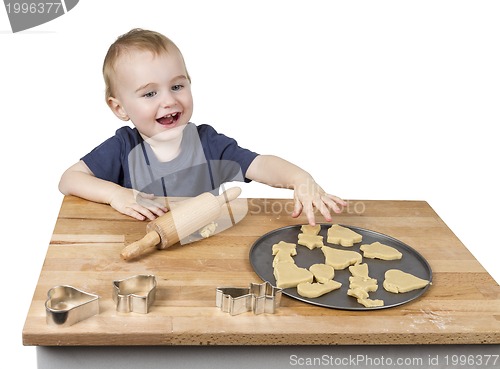 Image of child making cookies