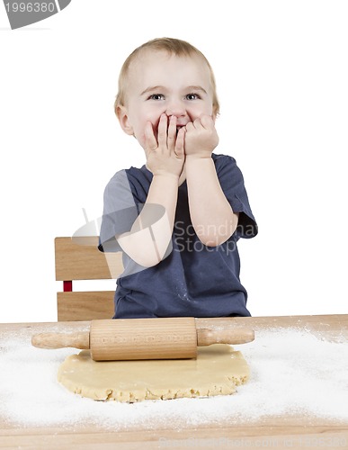 Image of child making cookies