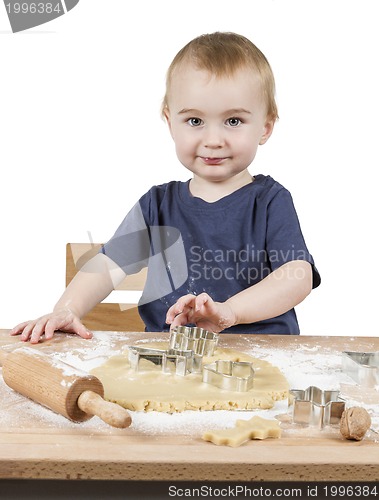 Image of child making cookies