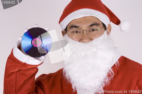 Image of Asian Santa Claus Holding CD