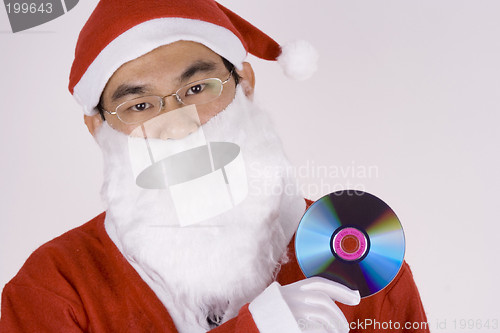 Image of Asian Santa Claus Holding CD