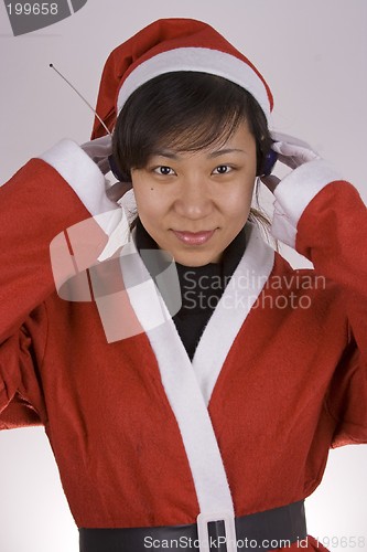 Image of Santa Claus Listening Music