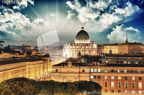 Image of Buildings of Rome with Vatican St Peter Dome in background - sun
