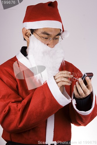 Image of Santa Claus Dialing