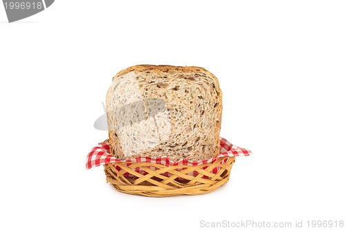 Image of Basket with bread isolated on white.