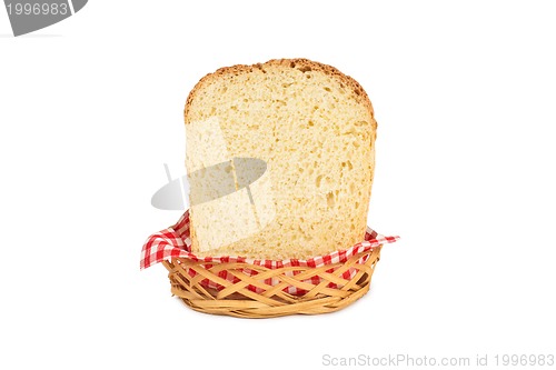 Image of Basket with bread isolated on white.