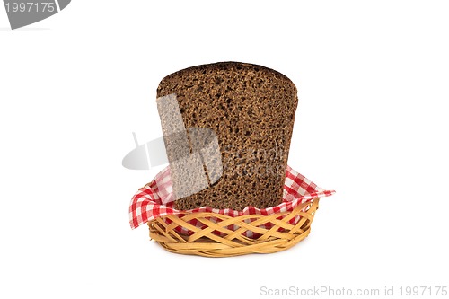Image of Basket with bread isolated on white.