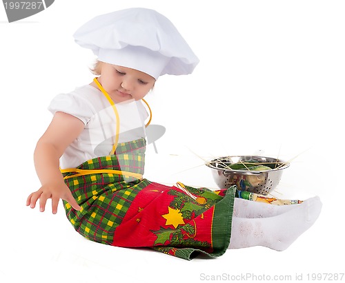 Image of baby girl in the cook hat