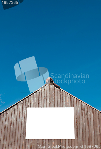 Image of Billboard on wooden structure