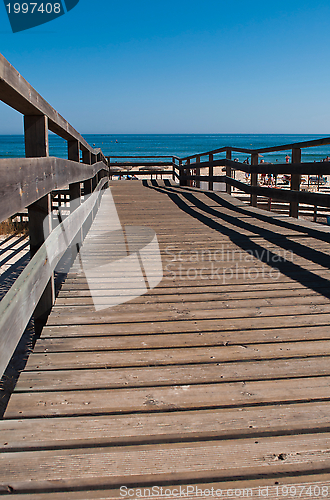 Image of Wooden walkway on beach