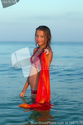 Image of beautiful teen girl in the sea