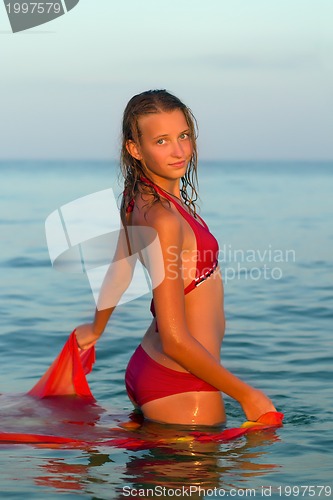 Image of cute teen girl in the sea