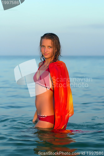 Image of nice teen girl in the sea